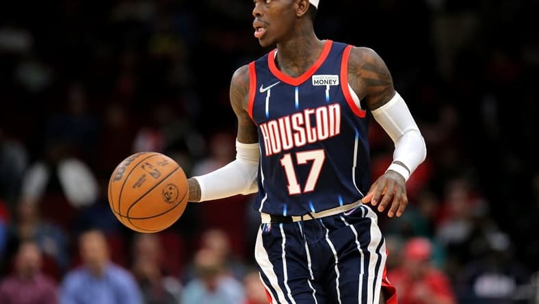 Mar 18, 2022; Houston, Texas, USA; Houston Rockets guard Dennis Schroder (17) handles the ball against the Indiana Pacers during the second quarter at Toyota Center. Mandatory Credit: Erik Williams-USA TODAY Sports