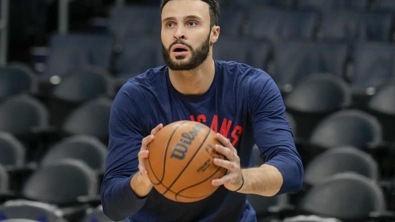 Mar 21, 2022; Charlotte, North Carolina, USA; New Orleans Pelicans forward Larry Nance Jr. (22) during pregame warmups against the Charlotte Hornets at Spectrum Center. Mandatory Credit: Jim Dedmon-USA TODAY Sports