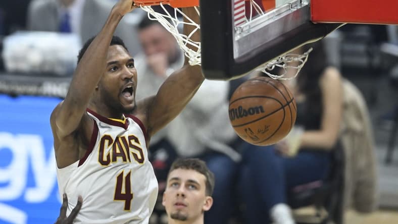 Mar 28, 2022; Cleveland, Ohio, USA; Cleveland Cavaliers center Evan Mobley (4) dunks in the first quarter against the Orlando Magic at Rocket Mortgage FieldHouse. Mandatory Credit: David Richard-USA TODAY Sports