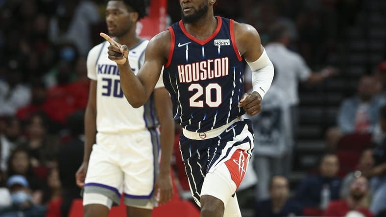Apr 1, 2022; Houston, Texas, USA; Houston Rockets forward Bruno Fernando (20) reacts after scoring during the third quarter against the Sacramento Kings at Toyota Center. Mandatory Credit: Troy Taormina-USA TODAY Sports