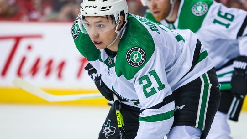 May 3, 2022; Calgary, Alberta, CAN; Dallas Stars left wing Jason Robertson (21) during the face off against the Calgary Flames during the third period in game one of the first round of the 2022 Stanley Cup Playoffs at Scotiabank Saddledome. Mandatory Credit: Sergei Belski-USA TODAY Sports