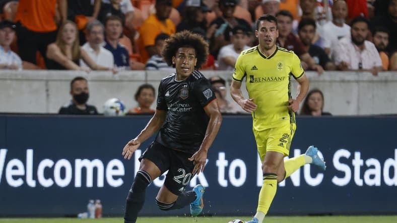 May 14, 2022; Houston, Texas, USA; Houston Dynamo midfielder Adalberto Carrasquilla (20) in action during the match against the Nashville SC at PNC Stadium. Mandatory Credit: Troy Taormina-USA TODAY Sports