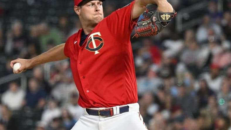 May 27, 2022; Minneapolis, Minnesota, USA; Minnesota Twins relief pitcher Trevor Megill (58) delivers a pitch against the Kansas City Royals during the fifth inning at Target Field. Mandatory Credit: Nick Wosika-USA TODAY Sports