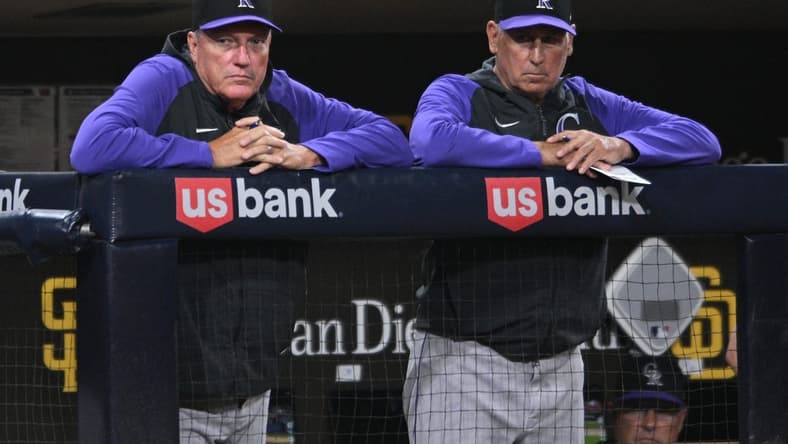 Jun 10, 2022; San Diego, California, USA; Colorado Rockies manager Bud Black (right) and hitting coach Dave Magadan  (left) look on from the dugout during the eighth inning against the San Diego Padres at Petco Park. Mandatory Credit: Orlando Ramirez-USA TODAY Sports
