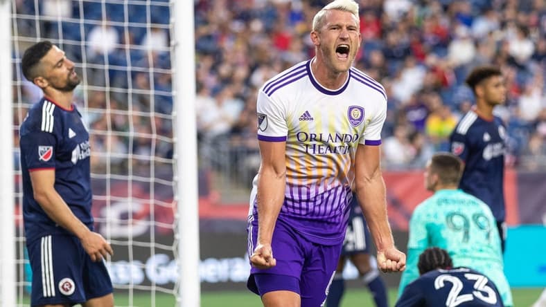 Jun 15, 2022; Foxborough, Massachusetts, USA; Orlando City SC defender Robin Jansson (6) celebrates after scoring a goal during the first half against the New England Revolution at Gillette Stadium. Mandatory Credit: Paul Rutherford-USA TODAY Sports