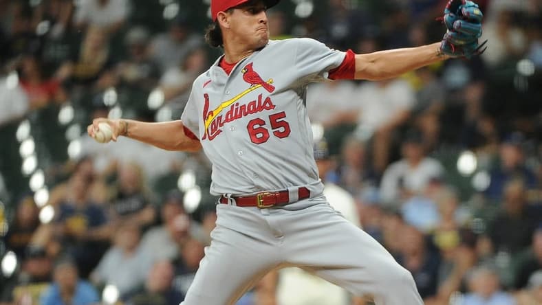 Jun 21, 2022; Milwaukee, Wisconsin, USA; St. Louis Cardinals relief pitcher Giovanny Gallegos (65) delivers a pitch in the sixth inning against the Milwaukee Brewers at American Family Field. Mandatory Credit: Michael McLoone-USA TODAY Sports