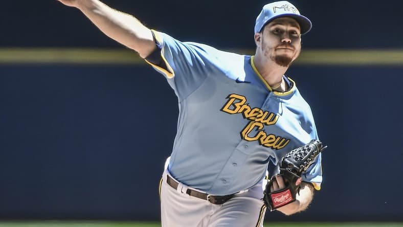 Jun 26, 2022; Milwaukee, Wisconsin, USA; Milwaukee Brewers pitcher Chi Chi Gonzalez (21) throws a pitch in the first inning against the Toronto Blue Jays at American Family Field. Mandatory Credit: Benny Sieu-USA TODAY Sports
