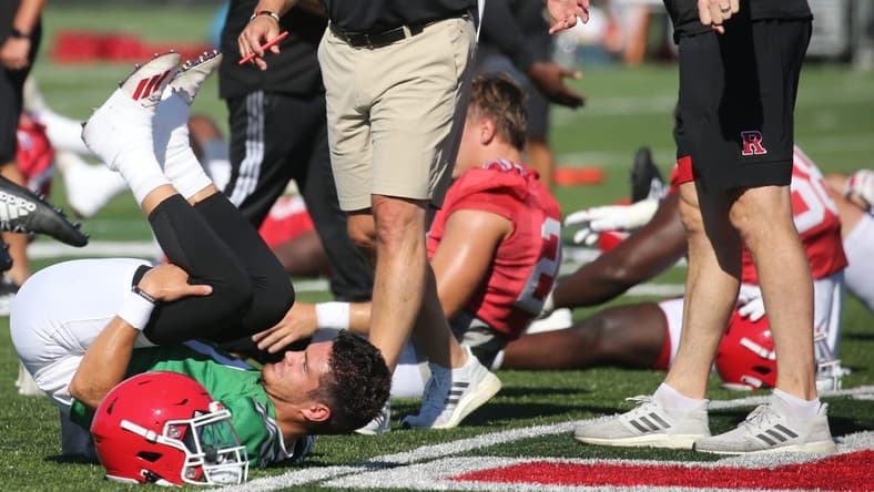 Quarterback, Noah Vedral, head coach Greg Schiano with offensive coordinator Sean Gleeson as Rutgers football players participate in their first day of training camp to start the 2022 season at their practice facility in Piscataway, NJ on August 3, 2022.

Rutgers Football Players Participate In Their First Day Of Training Camp To Start The 2022 Season At Their Practice Facility In Piscataway Nj On August 3 2022