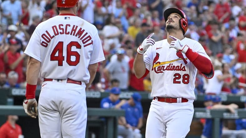 Aug 4, 2022; St. Louis, Missouri, USA; St. Louis Cardinals third baseman Nolan Arenado (28) celebrates with designated hitter Paul Goldschmidt (46) after hitting a two run home run against the Chicago Cubs during the first inning at Busch Stadium. Mandatory Credit: Jeff Curry-USA TODAY Sports