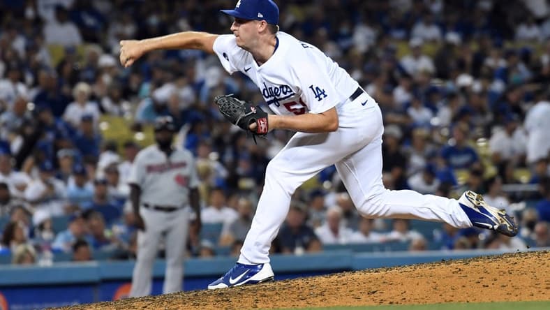 Aug 10, 2022; Los Angeles, California, USA; Los Angeles Dodgers relief pitcher Evan Phillips (59) pitches against the Minnesota Twins in the seventh inning at Dodger Stadium. Mandatory Credit: Richard Mackson-USA TODAY Sports