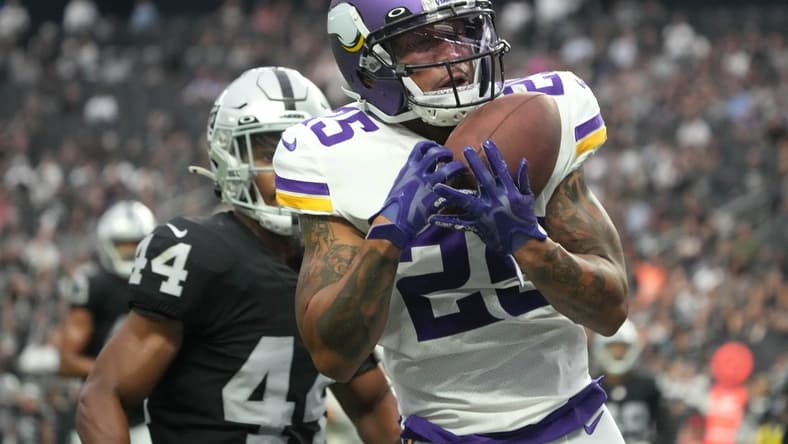 Aug 14, 2022; Paradise, Nevada, USA; Minnesota Vikings wide receiver Albert Wilson (25) catches a 20-yard touchdown pass in the fourth quarter against Las Vegas Raiders cornerback Bryce Cosby (44) at Allegiant Stadium. Mandatory Credit: Kirby Lee-USA TODAY Sports