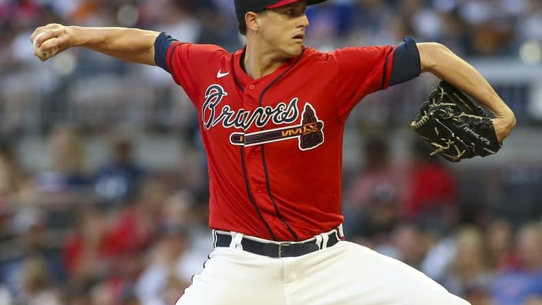 Aug 19, 2022; Atlanta, Georgia, USA; Atlanta Braves starting pitcher Kyle Wright (30) throws against the Houston Astros in the first inning at Truist Park. Mandatory Credit: Brett Davis-USA TODAY Sports