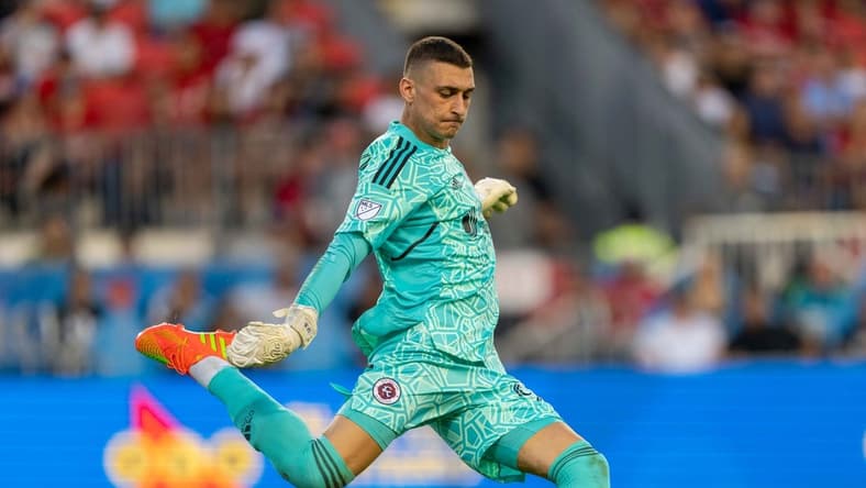 Aug 17, 2022; Toronto, Ontario, CAN; New England Revolution goalkeeper Djordje Petrovic (99) sets to take a goal kick against the Toronto FC during the first half at BMO Field. Mandatory Credit: Kevin Sousa-USA TODAY Sports