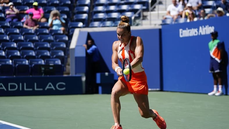 Aug 31, 2022; Flushing, NY, USA; Maria Sakkari of Greece hits to Xiyu Wang of China on day three of the 2022 U.S. Open tennis tournament at USTA Billie Jean King Tennis Center. Mandatory Credit: Danielle Parhizkaran-USA TODAY Sports