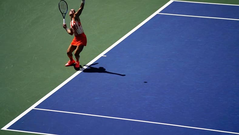 Aug 31, 2022; Flushing, NY, USA; Maria Sakkari of Greece serves to Xiyu Wang of China on day three of the 2022 U.S. Open tennis tournament at USTA Billie Jean King Tennis Center. Mandatory Credit: Danielle Parhizkaran-USA TODAY Sports