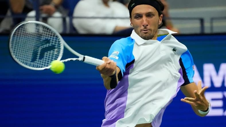 Aug 31, 2022; Flushing, NY, USA;   Arthur Rinderknech of France hits to Daniil Medvedev on day three of the 2022 U.S. Open tennis tournament at USTA Billie Jean King National Tennis Center. Mandatory Credit: Robert Deutsch-USA TODAY Sports
