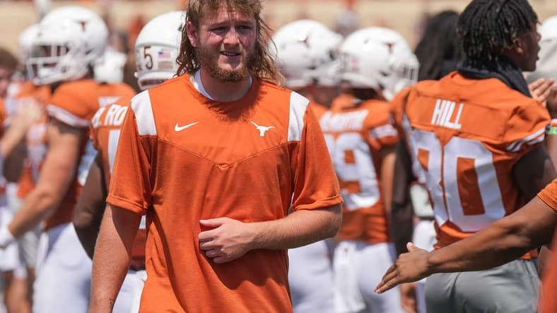 Sep 10, 2022; Austin, TX, USA; Texas quarterback Quinn Ewers walks to the medical tent during the fourth quarter of the loss to Alabama at Darrell K Royal Texas Memorial Stadium on Saturday September 10, 2022. Mandatory Credit: Jay Janner/Austin American-Statesman-USA TODAY NETWORK