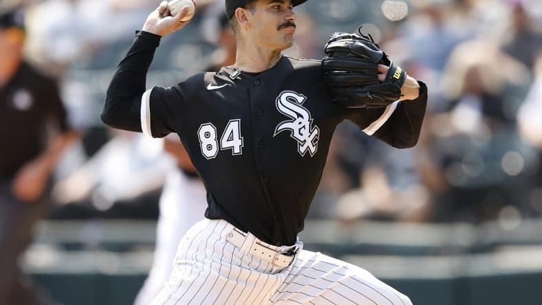 Sep 14, 2022; Chicago, Illinois, USA; Chicago White Sox starting pitcher Dylan Cease (84) delivers against the Colorado Rockies during the second inning at Guaranteed Rate Field. Mandatory Credit: Kamil Krzaczynski-USA TODAY Sports