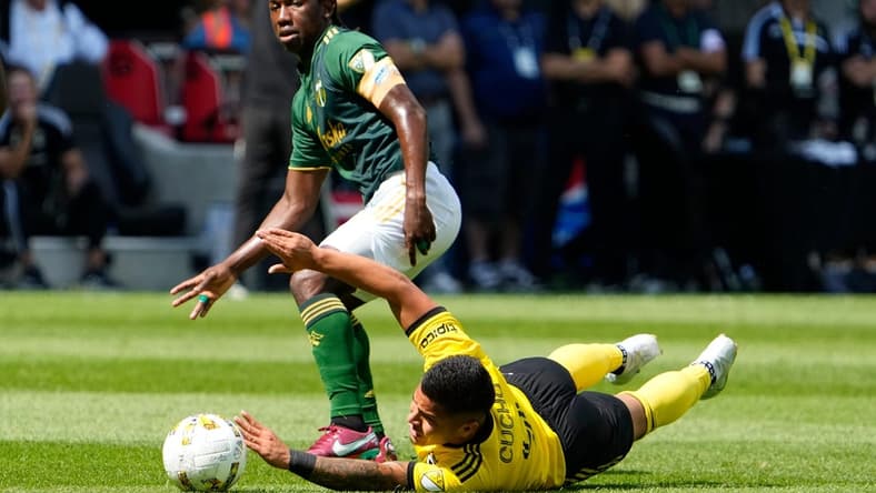 Sep 18, 2022; Columbus, Ohio, USA; Columbus Crew forward Cucho Hernandez (9) is fouled by Portland Timbers midfielder Diego Chara (21) during the first half of the MLS game at Lower.com Field. Mandatory Credit: Adam Cairns-The Columbus Dispatch

Mls Portland Timbers At Columbus Crew
