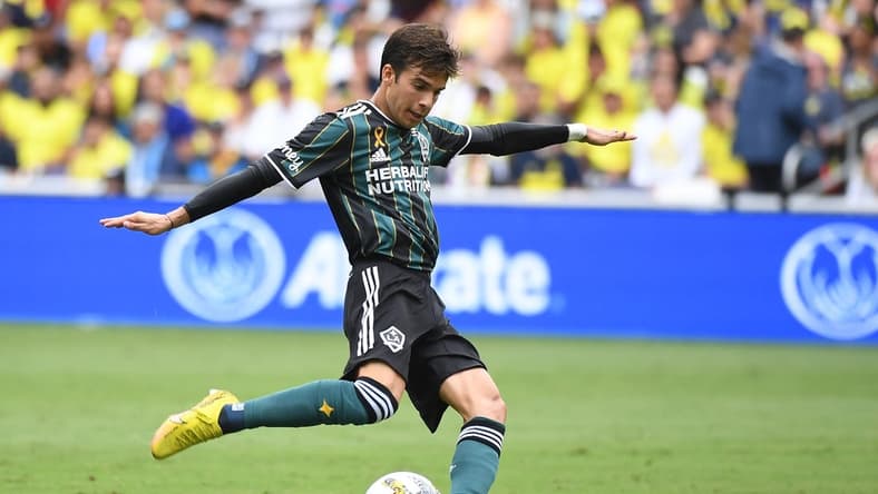 Sep 10, 2022; Nashville, Tennessee, USA; Los Angeles Galaxy midfielder Riqui Puig (6) attempts a shot during the first half against the Nashville SC at Geodis Park. Mandatory Credit: Christopher Hanewinckel-USA TODAY Sports