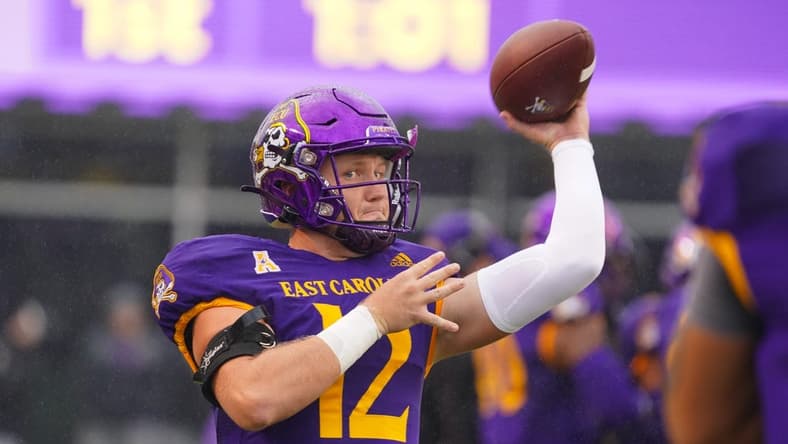 Sep 10, 2022; Greenville, North Carolina, USA;  East Carolina Pirates quarterback Holton Ahlers (12) throws the ball against the Old Dominion Monarchs before the game at Dowdy-Ficklen Stadium. Mandatory Credit: James Guillory-USA TODAY Sports