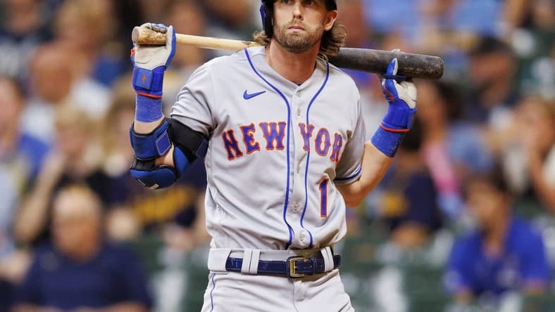 Sep 20, 2022; Milwaukee, Wisconsin, USA; New York Mets right fielder Jeff McNeil (1) reacts after striking out during the sixth inning against the Milwaukee Brewers at American Family Field. Mandatory Credit: Jeff Hanisch-USA TODAY Sports