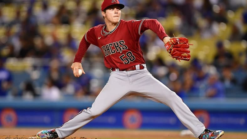 Sep 20, 2022; Los Angeles, California, USA; Arizona Diamondbacks relief pitcher Drey Jameson (58) throws against the Los Angeles Dodgers during the fourth inning at Dodger Stadium. Mandatory Credit: Gary A. Vasquez-USA TODAY Sports