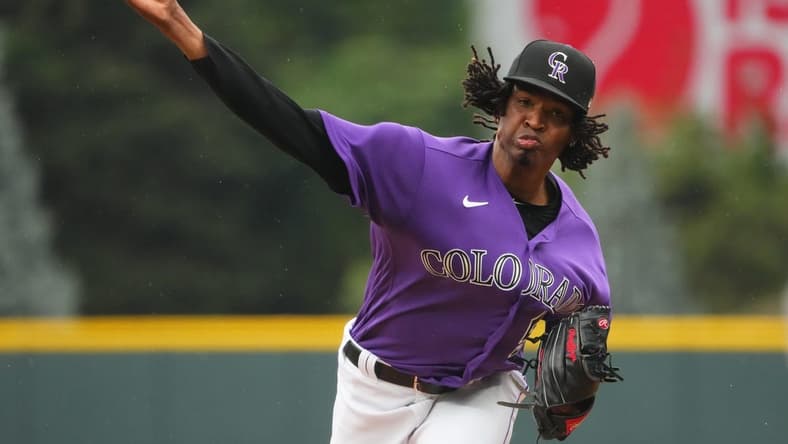Sep 22, 2022; Denver, Colorado, USA; Colorado Rockies starting pitcher Jose Urena (51) pitches in the first inning against the San Francisco Giants at Coors Field. Mandatory Credit: Ron Chenoy-USA TODAY Sports