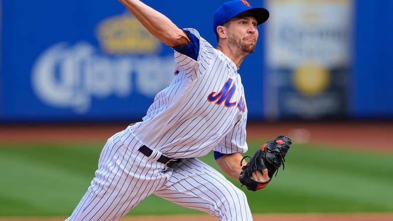Sep 18, 2022; New York City, New York, USA; New York Mets pitcher Jacob DeGrom (48) delivers a pitch against the Pittsburgh Pirates during the first inning at Citi Field. Mandatory Credit: Gregory Fisher-USA TODAY Sports