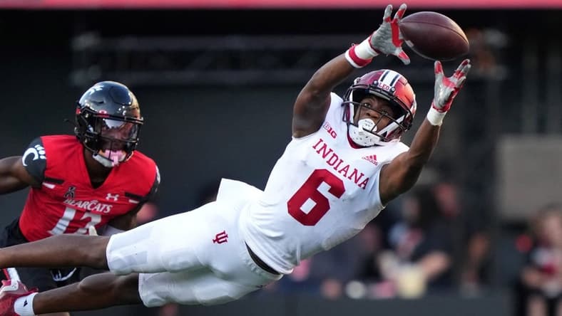 Sep 24, 2022; Cincinnati, Ohio, USA; Indiana Hoosiers wide receiver Cam Camper (6) extends to catch a pass against the Cincinnati Bearcats in the third quarter at Nippert Stadium. Mandatory Credit: Kareem Elgazzar/Cincinnati Enquirer via USA TODAY NETWORK