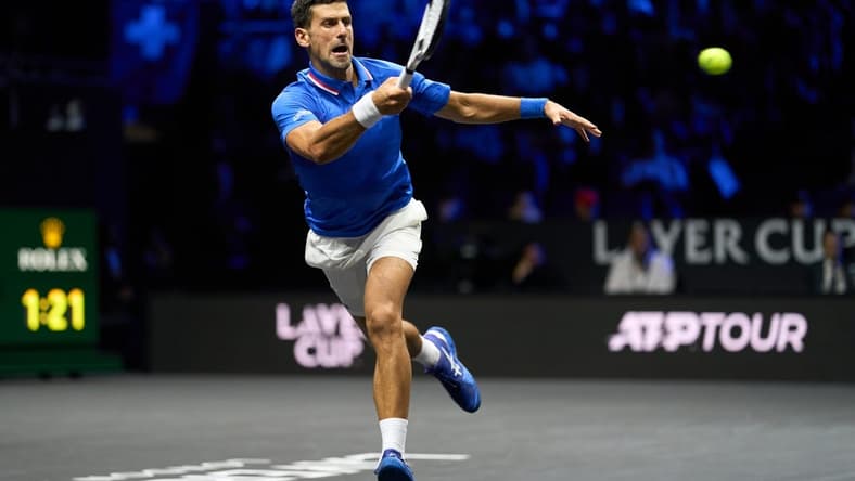 Sep 25, 2022; London, United Kingdom; Novak Djokovic (SRB) plays a shot against Felix Auger-Aliassime (CAN) in Lavers Cup singles. Mandatory Credit: Peter van den Berg-USA TODAY Sports