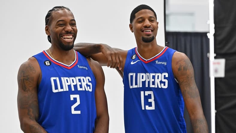 Sep 26, 2022; Playa Vista, CA, USA;  Los Angeles Clippers forward Kawhi Leonard (2) and Los Angeles Clippers guard Paul George (13) are photographed on media day at team headquarters in Playa Vista, CA. Mandatory Credit: Jayne Kamin-Oncea-USA TODAY Sports