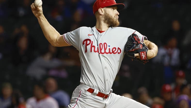 Sep 27, 2022; Chicago, Illinois, USA; Philadelphia Phillies starting pitcher Zack Wheeler (45) delivers against the Chicago Cubs during the first inning at Wrigley Field. Mandatory Credit: Kamil Krzaczynski-USA TODAY Sports