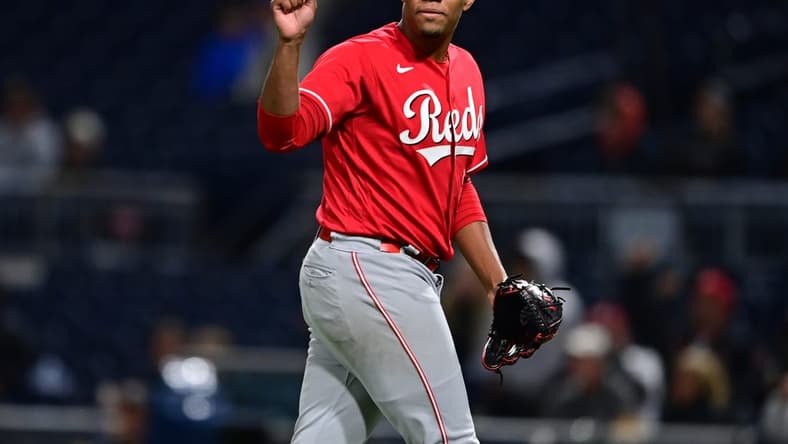 Sep 27, 2022; Pittsburgh, Pennsylvania, USA; Cincinnati Reds starting pitcher Hunter Greene (21) reacts after a ground out by Pittsburgh Pirates left fielder Miguel Andujar (26) during the fifth inning at PNC Park. Mandatory Credit: David Dermer-USA TODAY Sports