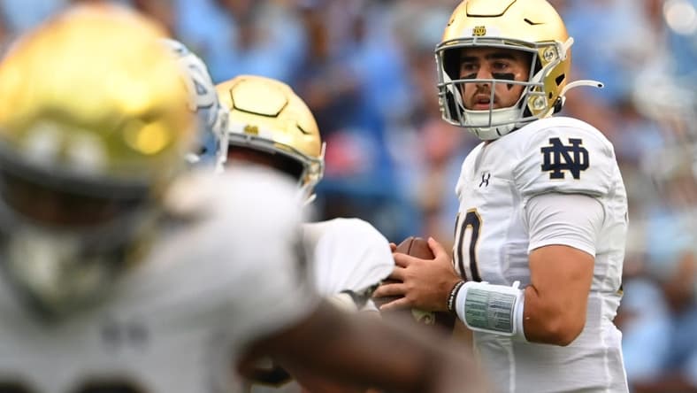 Sep 24, 2022; Chapel Hill, North Carolina, USA; Notre Dame Fighting Irish quarterback Drew Pyne (10) looks to pass in the second quarter at Kenan Memorial Stadium. Mandatory Credit: Bob Donnan-USA TODAY Sports