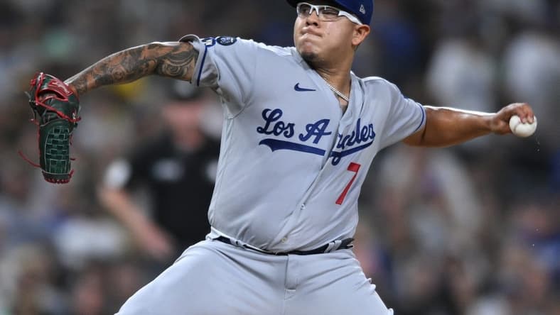 Sep 28, 2022; San Diego, California, USA; Los Angeles Dodgers starting pitcher Julio Urias (7) throws a pitch against the San Diego Padres during the first inning at Petco Park. Mandatory Credit: Orlando Ramirez-USA TODAY Sports