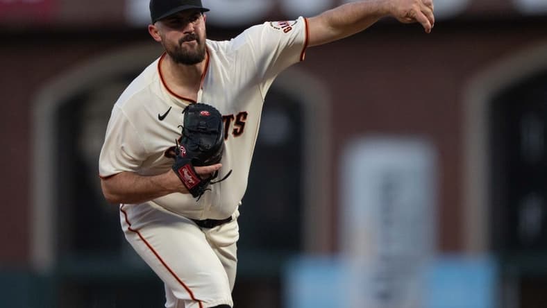 Sep 29, 2022; San Francisco, California, USA; San Francisco Giants starting pitcher Carlos Rodon (16) pitches during the first inning against the Colorado Rockies at Oracle Park. Mandatory Credit: Stan Szeto-USA TODAY Sports