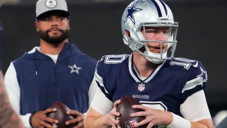 Sep 26, 2022; East Rutherford, NJ, USA; Dallas Cowboys quarterback Cooper Rush (10) warms up with injured Dallas Cowboys quarterback Dak Prescott (4) watching at MetLife Stadium. Mandatory Credit: Robert Deutsch-USA TODAY Sports