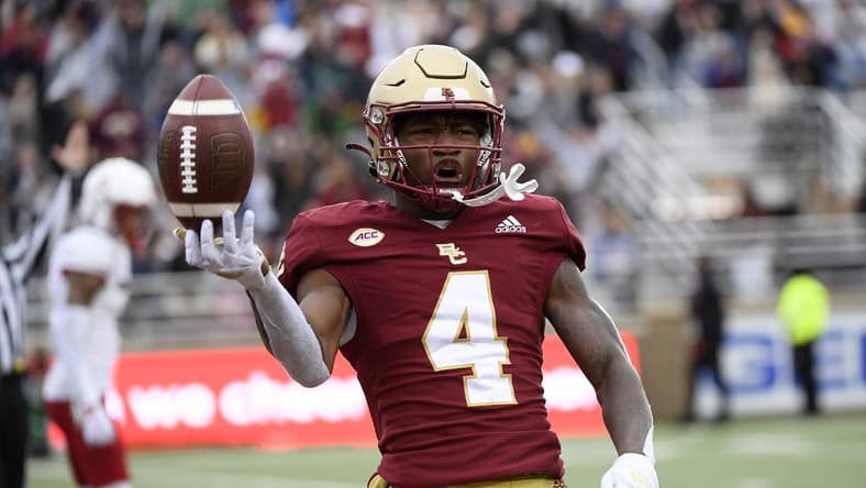 Oct 1, 2022; Chestnut Hill, Massachusetts, USA;  Boston College Eagles wide receiver Zay Flowers (4) reacts after scoring a touchdown during the first half against the Louisville Cardinals at Alumni Stadium. Mandatory Credit: Bob DeChiara-USA TODAY Sports