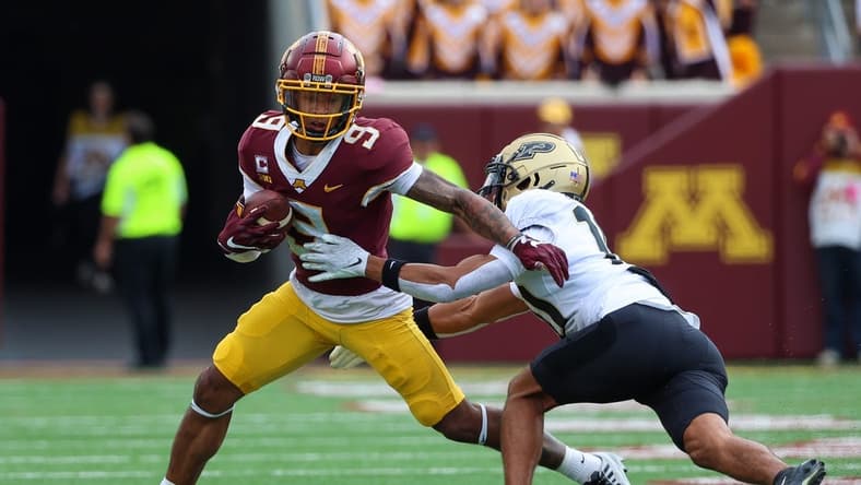 Oct 1, 2022; Minneapolis, Minnesota, USA; Minnesota Golden Gophers wide receiver Daniel Jackson (9) runs the ball against the Purdue Boilermakers during the second quarter at Huntington Bank Stadium. Mandatory Credit: Matt Krohn-USA TODAY Sports