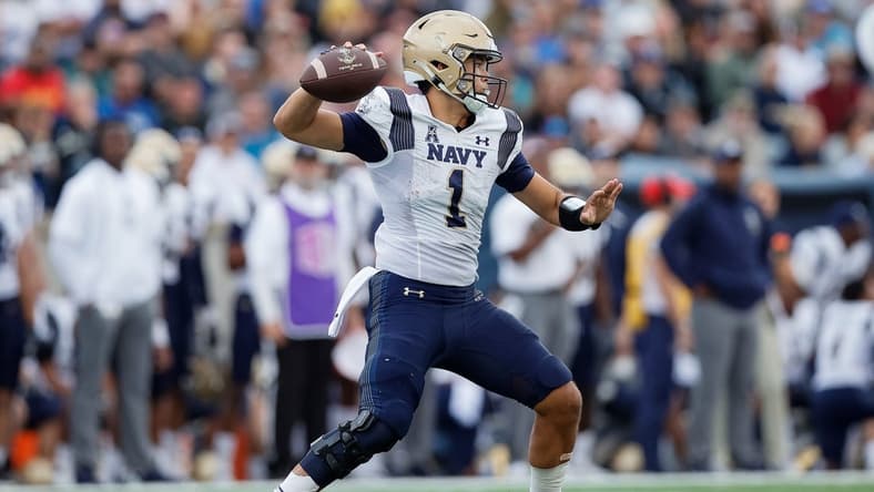 Oct 1, 2022; Colorado Springs, Colorado, USA; Navy Midshipmen quarterback Tai Lavatai (1) looks to pass in the fourth quarter against the Air Force Falcons at Falcon Stadium. Mandatory Credit: Isaiah J. Downing-USA TODAY Sports