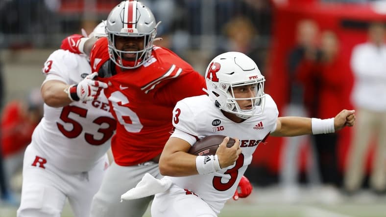 Oct 1, 2022; Columbus, Ohio, USA;  Rutgers Scarlet Knights quarterback Evan Simon (3) runs with the ball as Ohio State Buckeyes defensive tackle Taron Vincent (6) closes in for the tackle during the second quarter at Ohio Stadium. Mandatory Credit: Joseph Maiorana-USA TODAY Sports