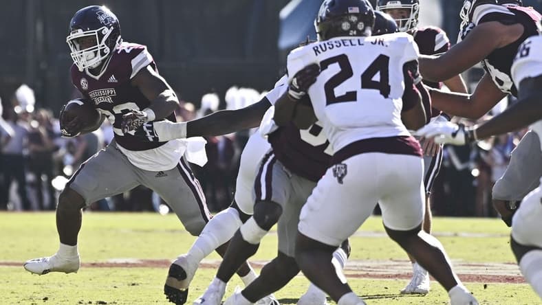 Oct 1, 2022; Starkville, Mississippi, USA;  Mississippi State Bulldogs running back Dillon Johnson (23) runs the ball against the Texas A&M Aggies during the second quarter at Davis Wade Stadium at Scott Field. Mandatory Credit: Matt Bush-USA TODAY Sports