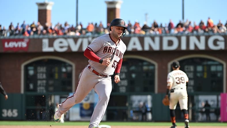 Oct 1, 2022; San Francisco, California, USA; Arizona Diamondbacks first baseman Christian Walker (53) runs to third base on a single hit by second baseman Josh Rojas (10) (not pictured) against the San Francisco Giants during the seventh inning at Oracle Park. Mandatory Credit: Robert Edwards-USA TODAY Sports