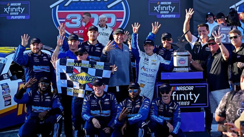 Oct 1, 2022; Talladega, Alabama, USA; NASCAR Xfinity Series driver AJ Allmendinger (16) celebrates winning the Sparks 300 at Talladega Superspeedway. Mandatory Credit: Peter Casey-USA TODAY Sports