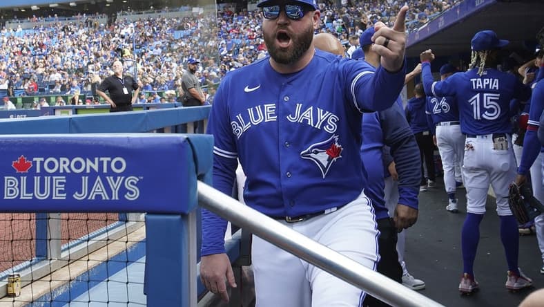 Oct 1, 2022; Toronto, Ontario, CAN; Toronto Blue Jays interim manager John Schneider in the dugout before the start of a game against the Boston Red Sox at Rogers Centre. Mandatory Credit: John E. Sokolowski-USA TODAY Sports