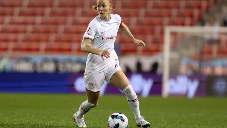 Oct 1, 2022; Harrison, New Jersey, USA; Portland Thorns FC defender Becky Sauerbrunn (4) kicks the ball against the NJ/NY Gotham FC during the second half at Red Bull Arena. Mandatory Credit: Craig Mitchelldyer-USA TODAY Sports