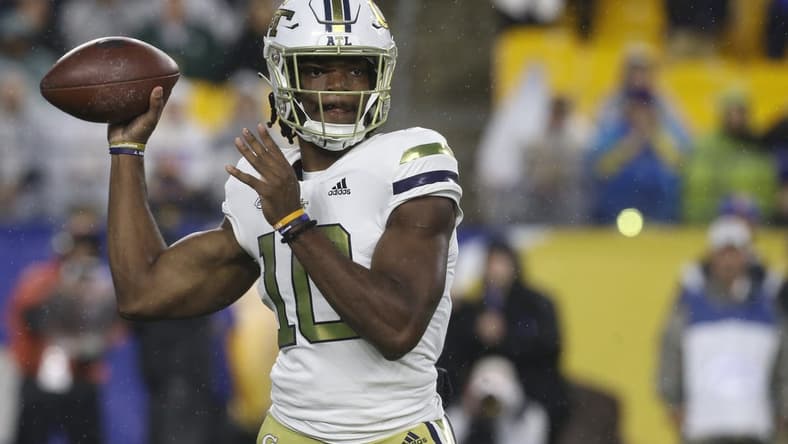Oct 1, 2022; Pittsburgh, Pennsylvania, USA; Georgia Tech Yellow Jackets quarterback Jeff Sims (10) throws a pass against the Pittsburgh Panthers during the first quarter at Acrisure Stadium. Mandatory Credit: Charles LeClaire-USA TODAY Sports