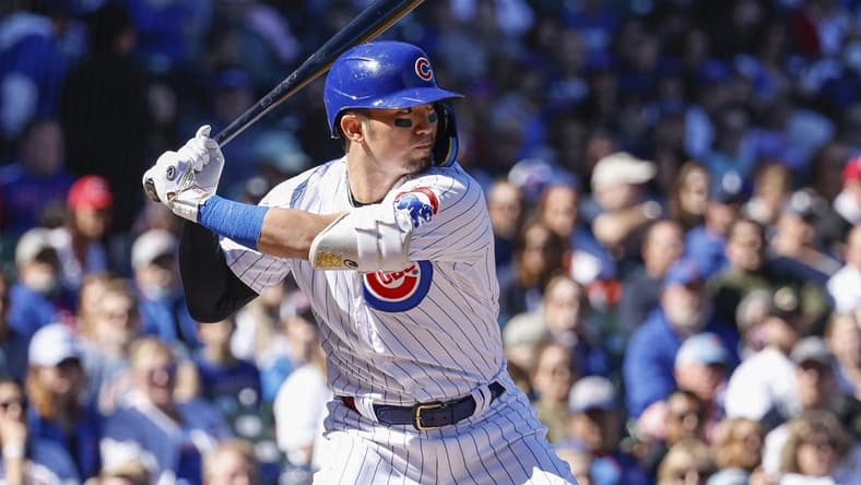 Oct 1, 2022; Chicago, Illinois, USA; Chicago Cubs right fielder Seiya Suzuki (27) bats against the Cincinnati Reds during the first inning at Wrigley Field. Mandatory Credit: Kamil Krzaczynski-USA TODAY Sports