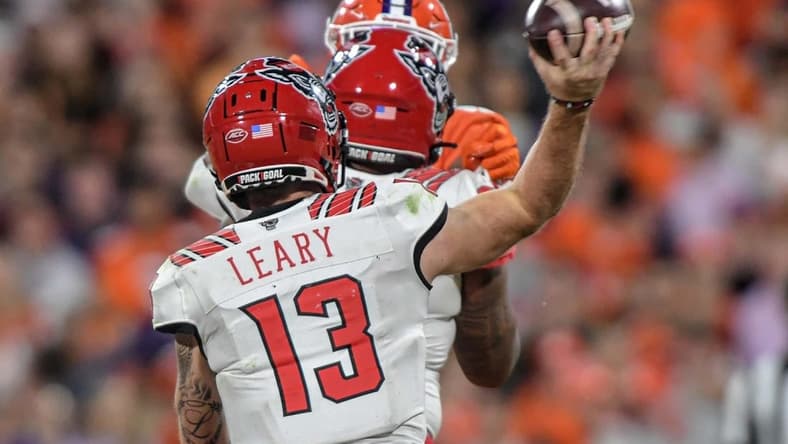 NC State quarterback Devin Leary (13) passes the ball during the fourth quarter at Memorial Stadium in Clemson, South Carolina Saturday, October 1, 2022.

Ncaa Football Clemson Football Vs Nc State Wolfpack